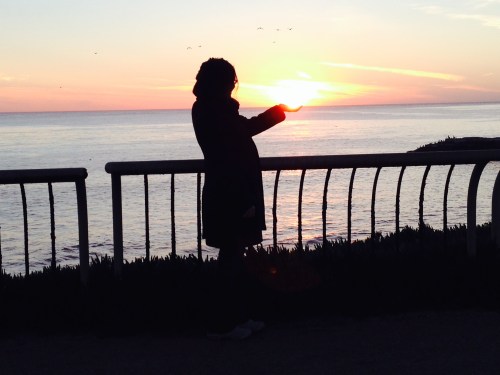 Holding the sun. Photo by Alexa Rubinov.